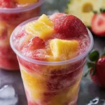 Delightful Pineapple Strawberry Swirled Slushies for a Cool Treat